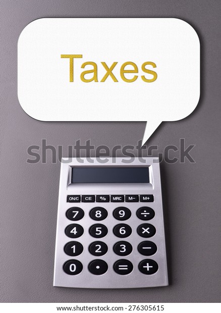 calculator with\
conversation icon showing -\
Taxes
