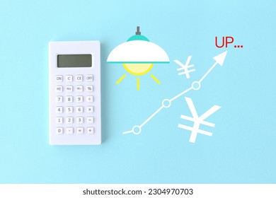 Calculator and electric utility pictogram with graph and Japanese yen mark - Shutterstock ID 2304970703