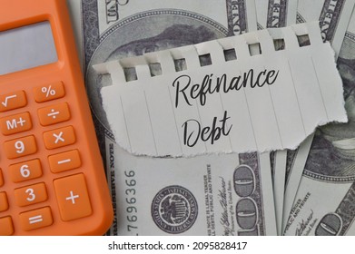 Calculator, money banknotes and torn paper with text REFINANCE DEBT - Shutterstock ID 2095828417