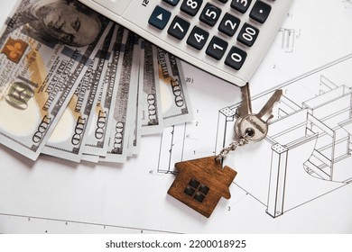 Calculator, Money And Home Key With House On Drawings. Top View.