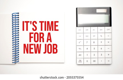 calculator and notepad with text IT'S TIME FOR A NEW JOB