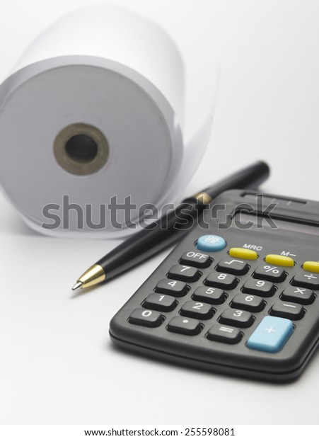 calculator on the adding tape\
machine