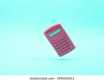 calculator on blue background close up