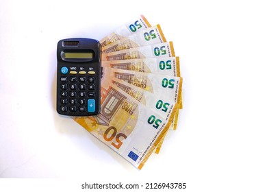 Calculator On Stack Of Euros Cash Money  ,white Background