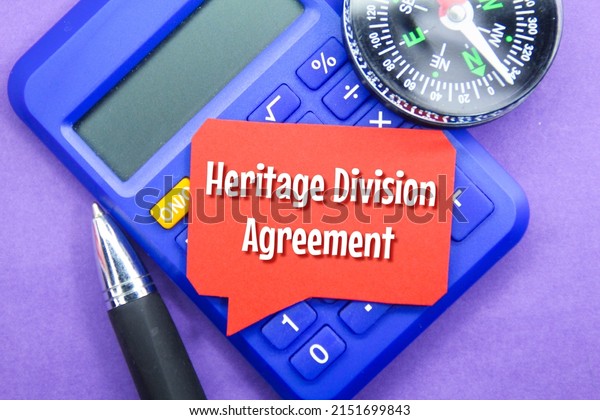 calculator, pen and conversation bubble with\
the words heritage division\
agreement