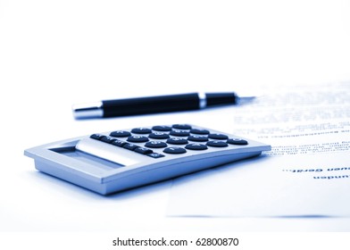 Calculator And Pen Isolated On White Background