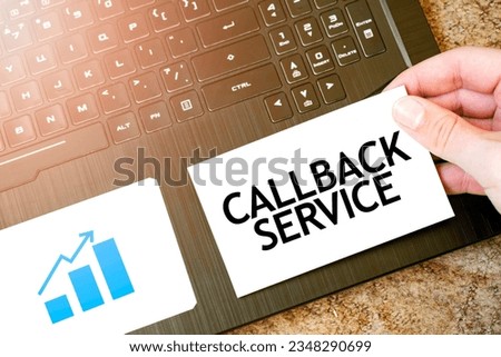 Calculator, red notepad, three colour pencils, silver pen and brown notebook with text CALLBACK SERVICE