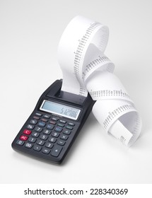 Calculator With Roll Of Adding Machine Tape