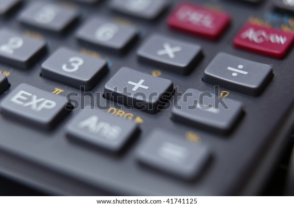 calculator (shallow depth of field - selective focus\
is placed on the \