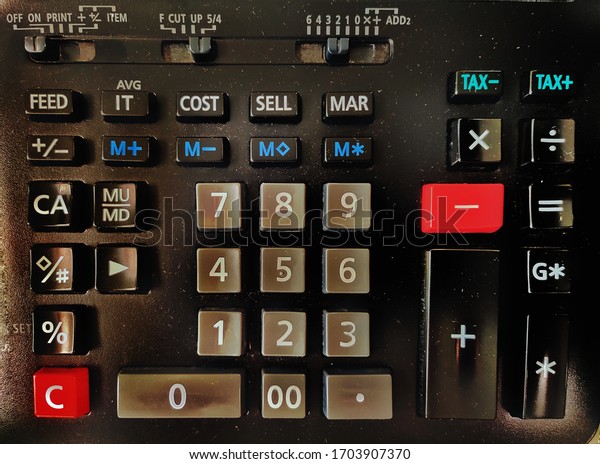 Calculator taken from top view.The image is\
darkened and shoot only the\
keybord.