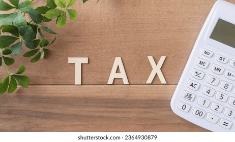 Calculator and tax characters.image of tax. - Shutterstock ID 2364930879