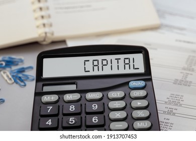 Calculator With The Word CAPITAL On Display. Business, Tax And Financial Concept