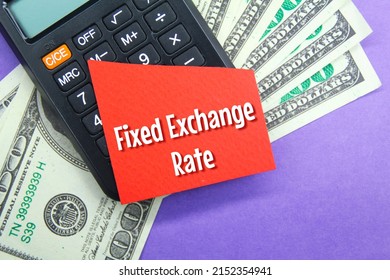 Calculators, Banknotes And Colored Paper With The Words Fixed Exchange Rate