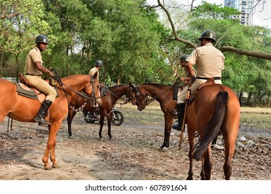 Calcutta, India - March, 10, 2014: Indian Mountain Police Police Raiding Over Horse.