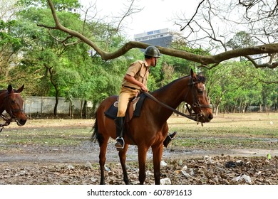 Calcutta, India - March, 10, 2014: Indian Mountain Police Police Raiding Over Horse.