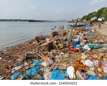 Calcutta,WestBengal,India,11 Th April 2021 : The Holy Ganges Reaches Maxim Level Of Pollution,in Spite,of That People Performing Ritual Bathing