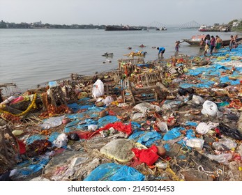 Calcutta,WestBengal,India,11 Th April 2021 : The Holy Ganges Reaches Maxim Level Of Pollution,in Spite,of That People Performing Ritual Bathing