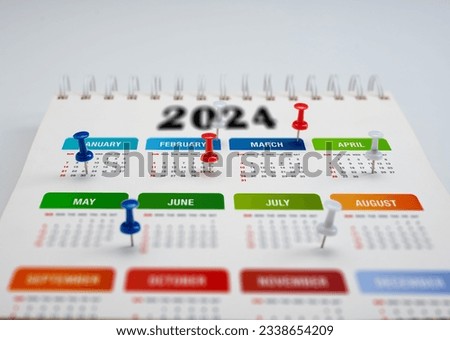 Calendar 2024 planning. colorful pin marks important dates. 2024 Planner calendar, clock to set timetable organize schedule, planning for business meeting, planning concept.