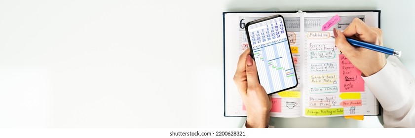 Calendar Appointment Schedule. Woman Using Smartphone And Paper Calendar