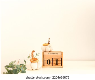 Calendar With Date November 1. Fabric Pumpkins Next To The Date November 1 On A White Background. All Saints Day. Public Holiday.