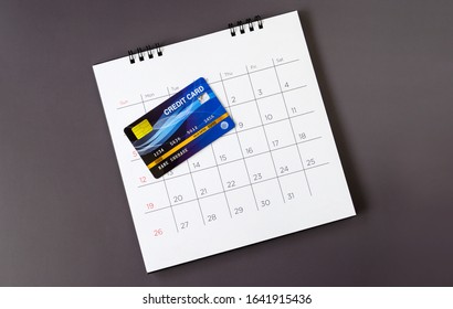 Calendar With Days And Credit Card On Table. Shopping Concept