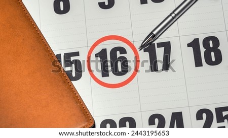 calendar highlighting the 16th marked with a red circle on the sixteenth day	

