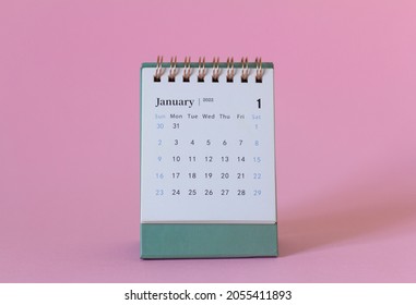 Calendar For January 2022 . Desktop Calendar On A Pink Background.Hello, The Year Is 2022