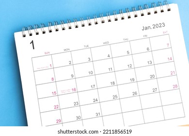 calendar January 2023 top view on a blue background