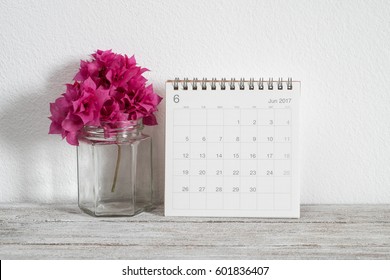 calendar june 2017 on wooden table in room - Powered by Shutterstock