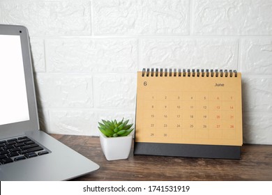 Calendar And Laptop For Planner And Organizer To Plan And Reminder Daily Appointment , Meeting Agenda, Schedule, Timetable And Management  Job, Work Online From Home. Calendar Reminder Event Concept