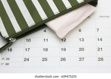 Calendar And Menstruation Sanitary Soft Cotton Pads. Woman Critical Days, Gynecological Menstrual Cycle. Stripe Beautician With Cotton Pad. Travel Cosmetic Bag. Hygiene Protection For Women