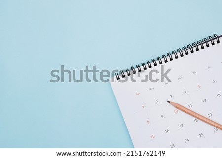 calendar on the blue. empty copy space for text. concept for busy timeline organize schedule,appointment and meeting reminder. planning for business meeting or travel holiday planning concept.