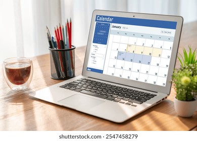 Calendar on computer software application for schedule planning for personal organizer and online business snugly