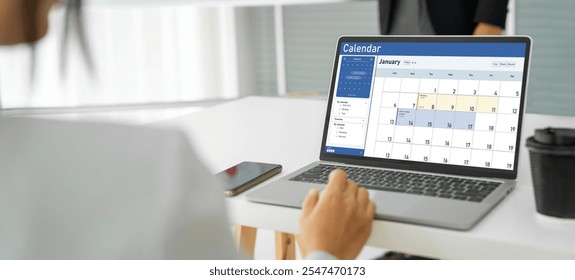 Calendar on computer software application for schedule planning for personal organizer and online business snugly