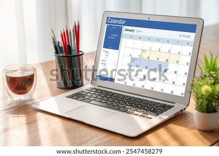 Calendar on computer software application for schedule planning for personal organizer and online business snugly