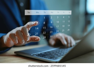 Calendar on the virtual screen interface, Businessman manages time for effective work, Highlight appointment reminders and meeting agenda on the calendar. Time management concept. Actions plans.