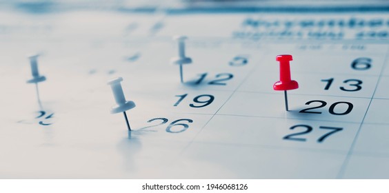 Calendar page pinned in a calender on datebusiness meeting schedule, travel planning or project milestone and reminder concept. - Shutterstock ID 1946068126
