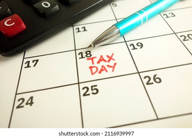 Calendar showing deadline day for filling income tax form - April 18, 2022, financial concept