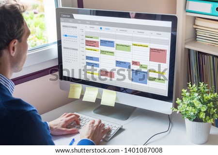 Calendar software showing busy schedule of manager with many meetings, tasks and appointments during the week, time management organization at work concept, business person using agenda on computer