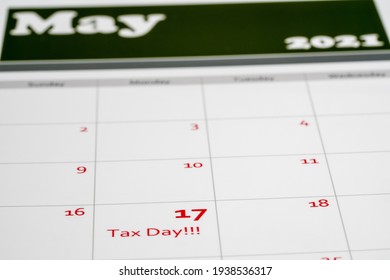 Calendar With Tax Day Note Inserted In The Date For May 17 To Illustrate The New Tax Return Filing Date Of 17th May 2021.