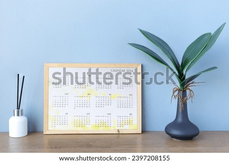 Calendar year 2024 schedule , 12 months desk calendar 2024 on wooden table. New Year plans for 2024,Happy new year 2024 concept