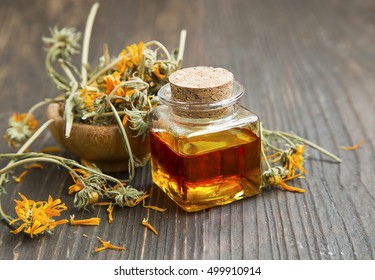 Calendula Oil Bottle With Dried Flowers