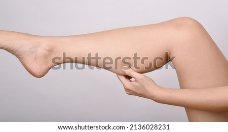 Calf fat, Fat woman pinching thigh leg skin, Overweight body test.