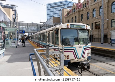 Calgary, AB, Canada - March 14 2022 : CTrain Stop At City Hall Station. Downtown Calgary.