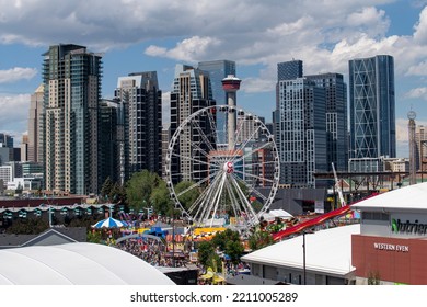 Calgary, AB, Canada-August 2022; High Angle View Over Stampede Park During The Calgary Stampede, The Greatest Outdoor Show On Earth, With Rodeo And Chuckwagon Races And Downtown In Background