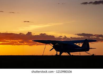 CALGARY, AB - May 5, 2018 A Small, Single Engine Airplane Parked At A Small General Aviation Airport At Sunset