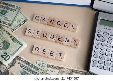 Calgary, Alberta - April 21, 2022: Sutdent debt concept with american dollars as a background.
