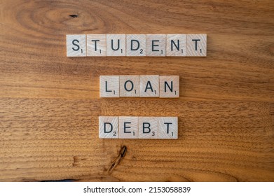 Calgary, Alberta - April 21, 2022: Cancel student debt concept with american dollars.