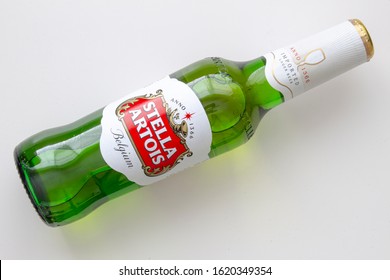 Calgary Alberta Canada. Jan 19 2020. A Stella Artois Beer Bottle Lay Down On A White Table