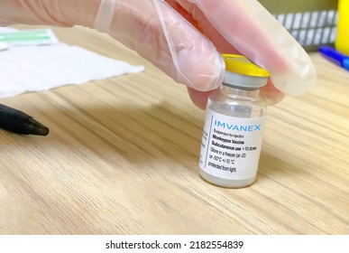 Calgary, Alberta, Canada. Jul 25, 2022. 
A Healthcare Worker Holding A Imvanex Monkeypox Vaccine Vial Wearing Elastic Gloves A Pharmacy. 